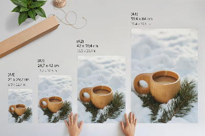 Foto su tela Tazza di legno, paesaggio innevato, ramoscelli verdi