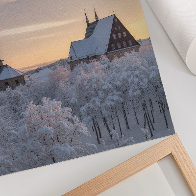 Foto su tela Paesaggio invernale con una chiesa innevata