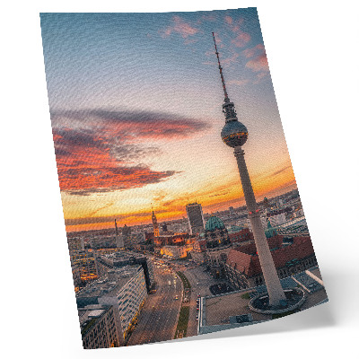 Foto su tela Torre della città al tramonto