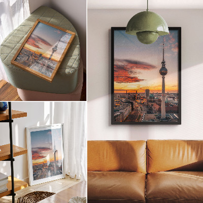 Foto su tela Torre della città al tramonto