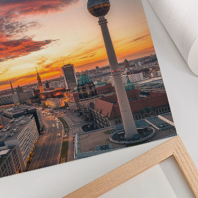 Foto su tela Torre della città al tramonto