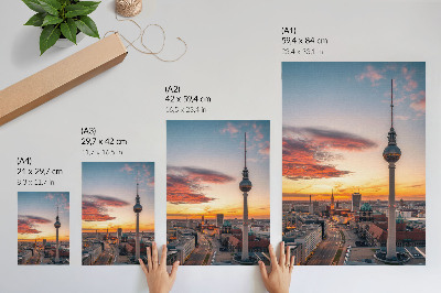 Foto su tela Torre della città al tramonto