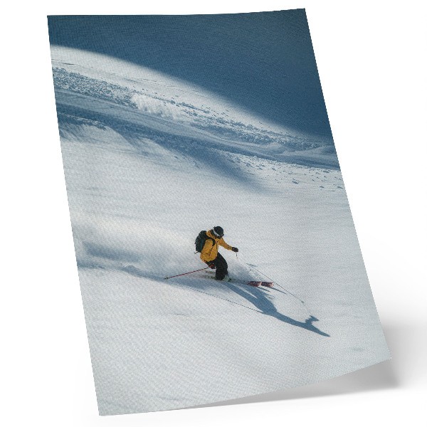 Stampa su tela Sciatore giacca gialla pendio innevato ombra