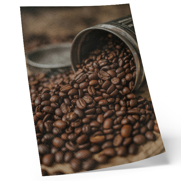 Stampa su tela Chicchi di caffè sparsi direttamente dalla lattina