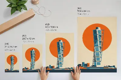Foto su tela sole arancione con grattacielo moderno dalle forme geometriche