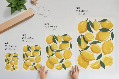 Foto su tela con limoni dorati e foglie verdi su sfondo luminoso senza movimento