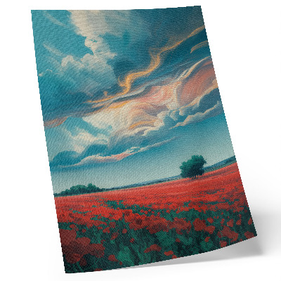 Stampa su tela Un coloratissimo prato di papaveri sotto un cielo infuocato