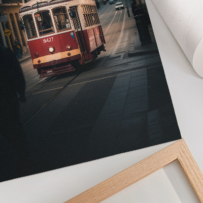 Poster Un tram tra gli edifici storici della città.