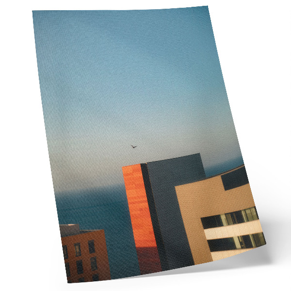 Stampa su tela Modernità, mare, edifici, uccello, immensità, cielo