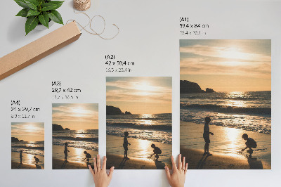Stampa su tela Bambini sulla spiaggia al tramonto