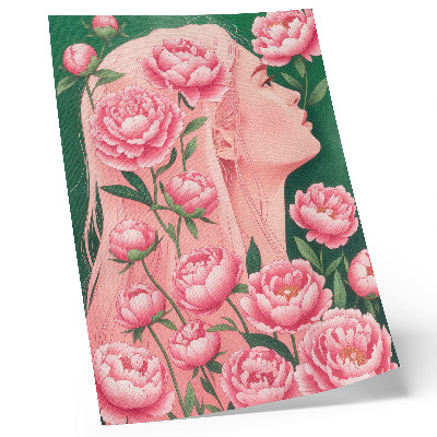 Stampa su tela Una donna tra peonie rosa su uno sfondo verde