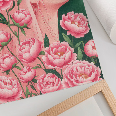 Stampa su tela Una donna tra peonie rosa su uno sfondo verde