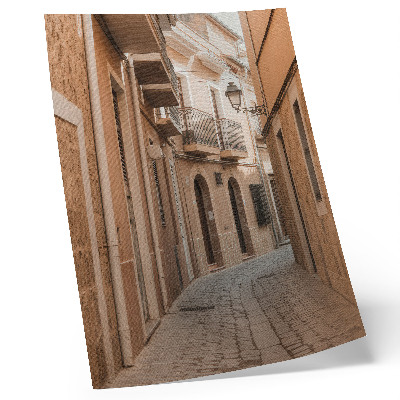 Foto su tela Via stretta, edifici in pietra, tonalità calde