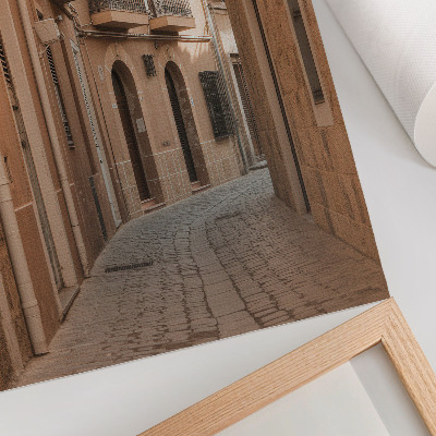 Foto su tela Via stretta, edifici in pietra, tonalità calde