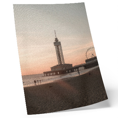 Foto su tela Torre sulla spiaggia, cielo color pastello, vista panoramica