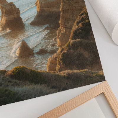 Foto su tela Scogliere rocciose al tramonto sul mare