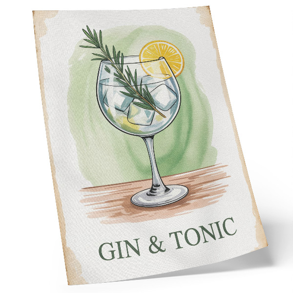 Foto su tela Un bicchiere di gin, rosmarino e limone su uno sfondo verde.