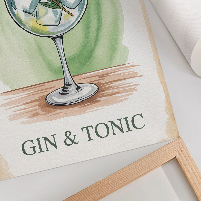 Foto su tela Un bicchiere di gin, rosmarino e limone su uno sfondo verde.