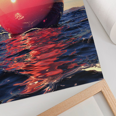 Stampa su tela Una palla gigantesca sull'acqua dai colori caldi