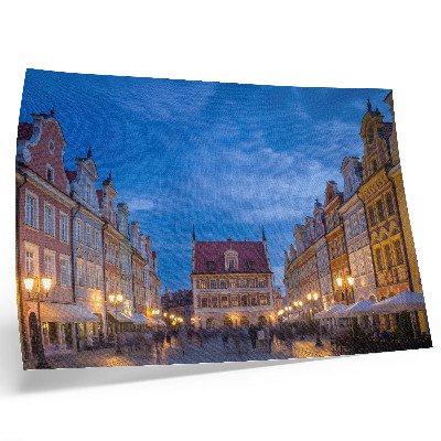 Poster dai colori saturi Case storiche illuminate di sera con luci colorate