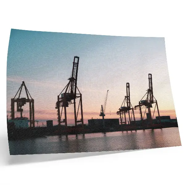 Poster murale di alta qualità raffigurante gru nel porto al tramonto