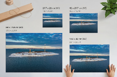 Stampa su tela moderna Isola invernale con faro e mare blu