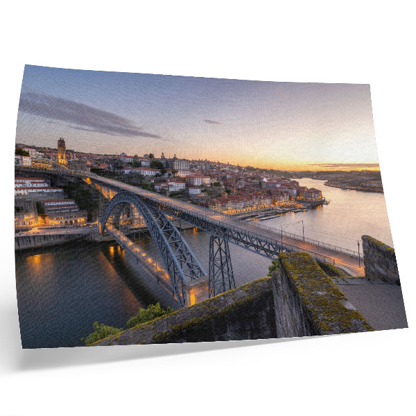 Poster Il ponte sullo sfondo del sole al tramonto e della città
