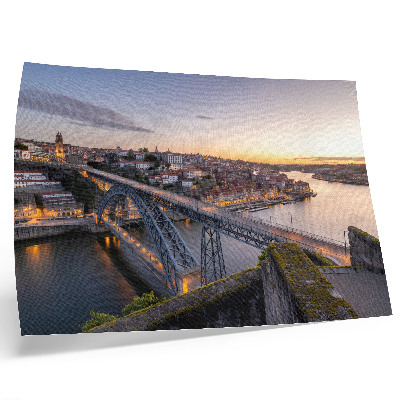 Poster Il ponte sullo sfondo del sole al tramonto e della città