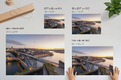 Poster Il ponte sullo sfondo del sole al tramonto e della città
