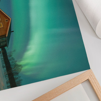 Poster dai colori saturi Aurora boreale sopra il cottage invernale