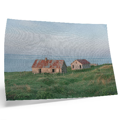 Poster Edifici rustici, prati verdi, mare