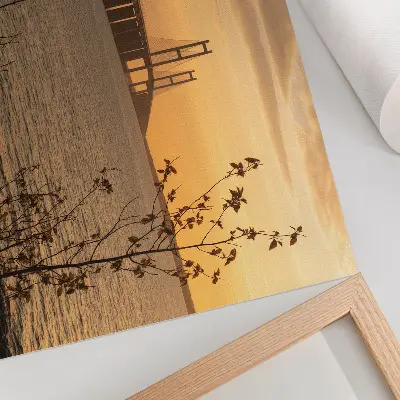 Ponte al tramonto con un albero poster con colori saturi