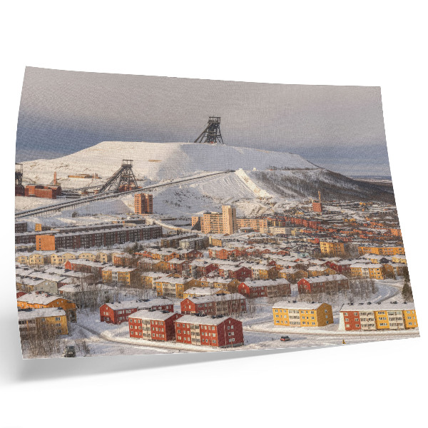 Poster murale di alta qualità Cittadina invernale con edifici colorati che contrastano con la neve