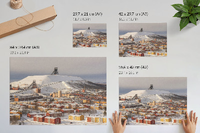 Poster murale di alta qualità Cittadina invernale con edifici colorati che contrastano con la neve