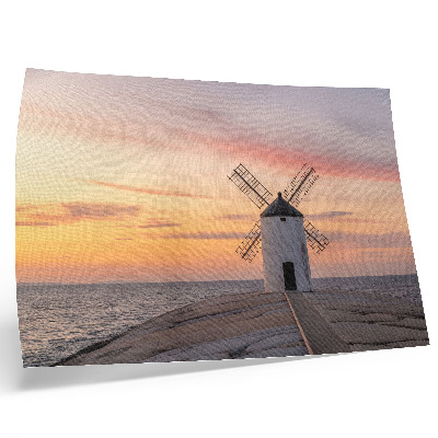 Stampa su tela moderna Mulino a vento alla luce del tramonto, mare, cielo color pastello