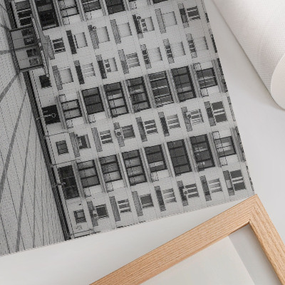 Poster dai colori saturi Un edificio moderno con balconi e una piazza