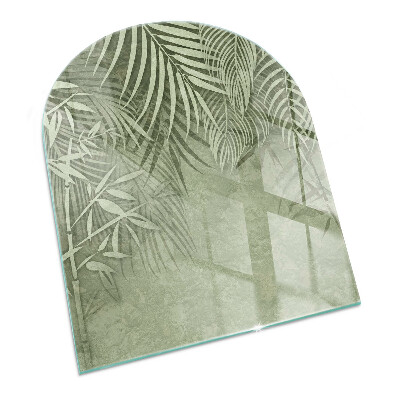 Vetro sotto stufa semi-ovale Foglie tropicali sullo sfondo