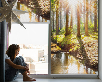 Tenda a rullo per finestra con stampa del sole che splende tra gli alberi