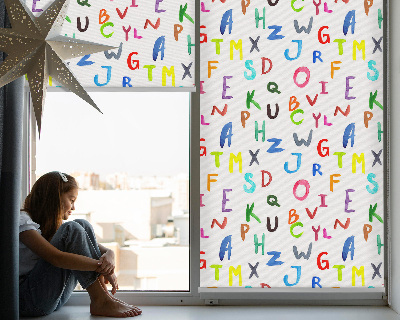 Tenda a rullo per porta finestra con fantasia di lettere colorate