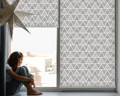 Tenda a rullo oscurante in tessuto con fantasia a triangoli e righe