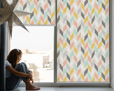 Tenda a rullo interna oscurante con fantasia spina di pesce colorata