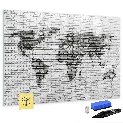 Lavagna magnetica con stampa di mappa del mondo su muro di mattoni