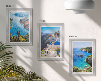 Composizione di 3 quadri Panorami costieri greci e la cittadina di Oia a Santorini.