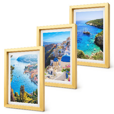 Composizione di 3 quadri Panorami costieri greci e la cittadina di Oia a Santorini.