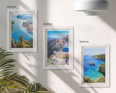Composizione di 3 quadri Panorami costieri greci e la cittadina di Oia a Santorini.