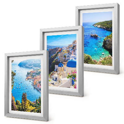 Composizione di 3 quadri Panorami costieri greci e la cittadina di Oia a Santorini.