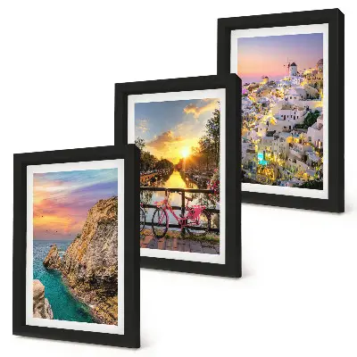 Vista sul mare con tramonto e sulla città trittico incorniciato