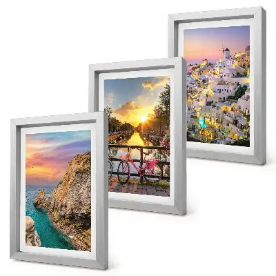 Vista sul mare con tramonto e sulla città trittico incorniciato