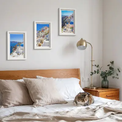 Composizione di 3 quadri vedute di architettura paesaggistica della città di Oia a Santorini in Grecia