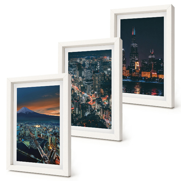 Trittico incorniciato Vista notturna della città dalle montagne, con i grattacieli sullo sfondo.